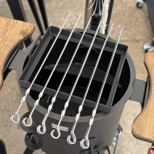 Iešmų laikiklis krosnelei